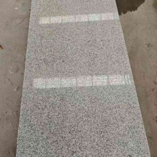 无锡芝麻白光面毛板